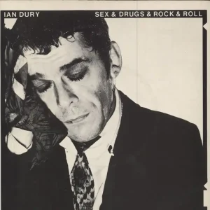 Holiday Sale Ian Dury Sex & Drugs & Rock & Roll + P/S - Solid UK 7" vinyl