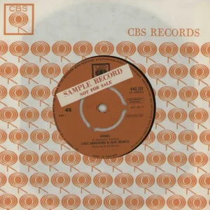 Original Dave Brubeck Nomad - sample stickered UK 7" vinyl